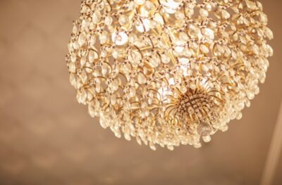 beautiful Crystal Chandelier hanging on wall
