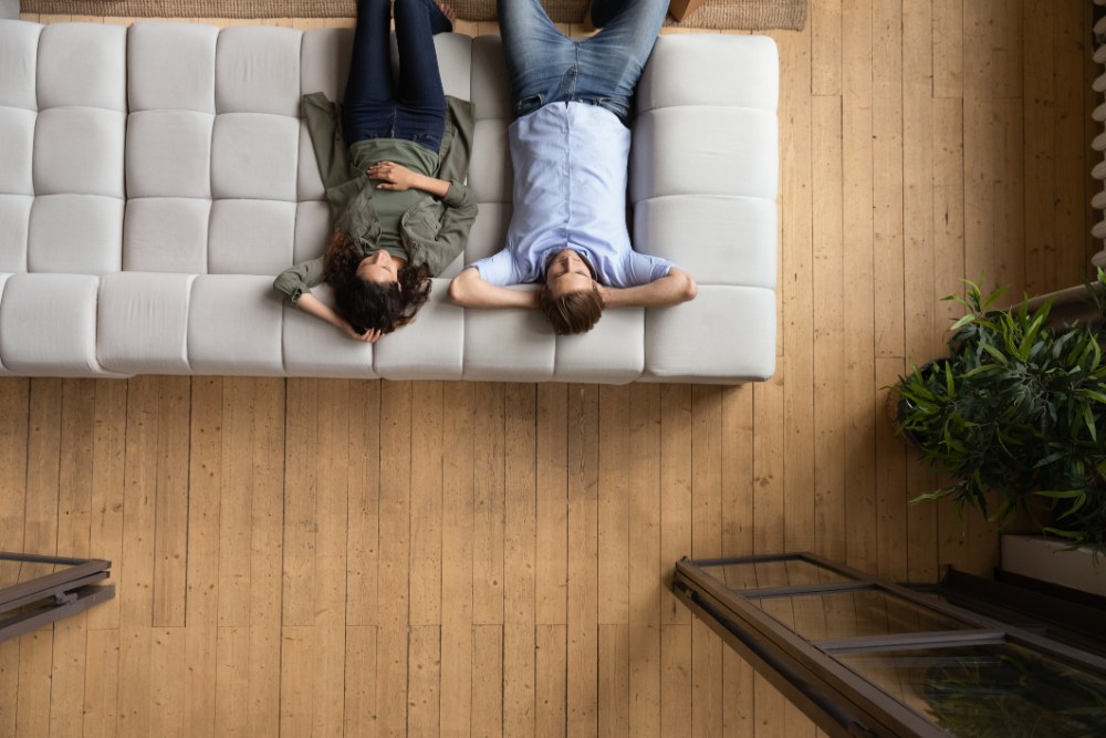 Couple relaxing on sofa